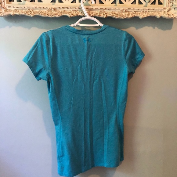 Under Armour shortsleeved blue gym shirt. - Picture 2 of 2
